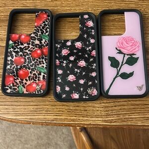 Three wildflower iPhone 14 Pro cases